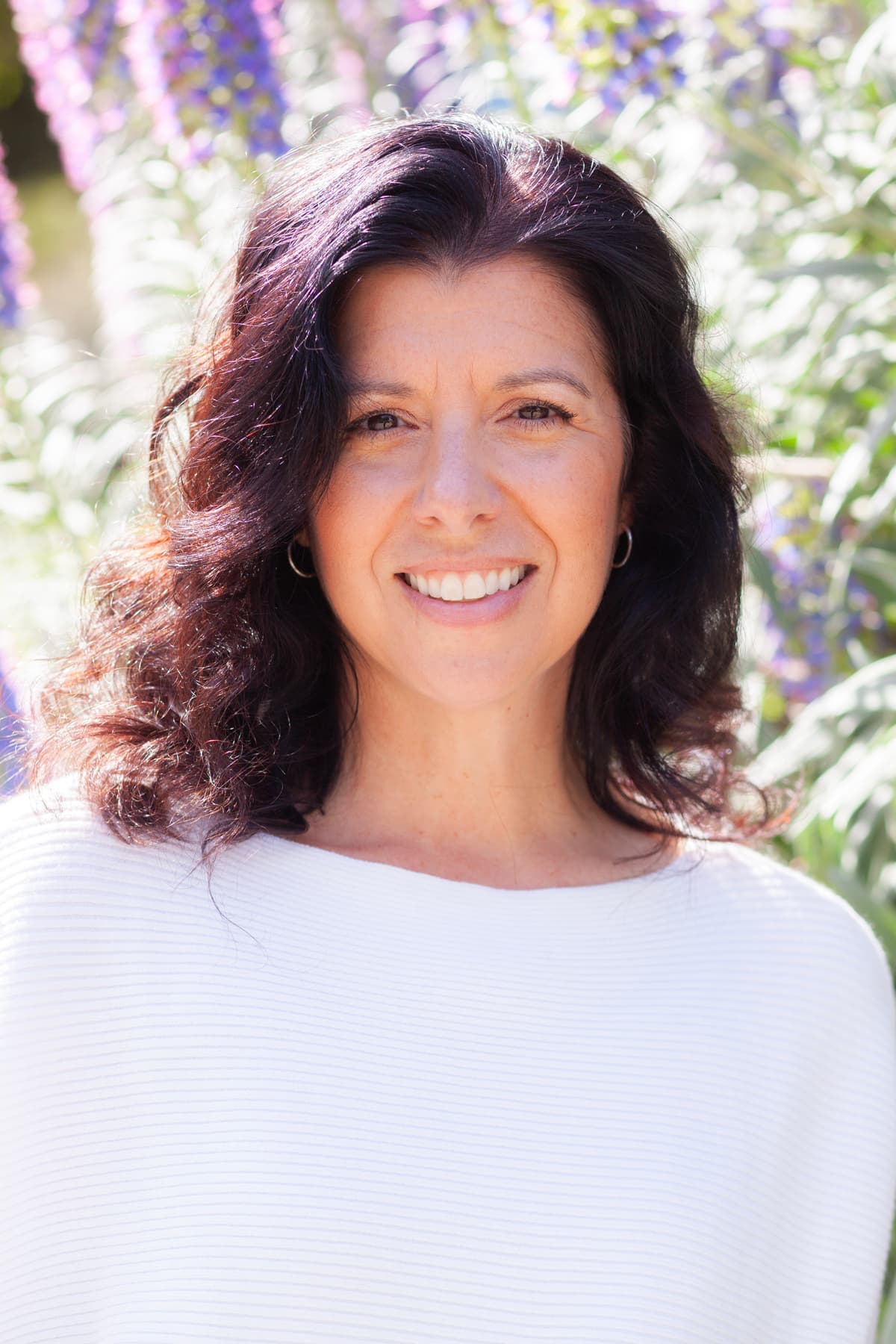 Stephanie among flowers in nature